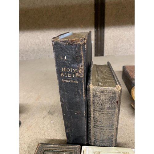 1238 - THREE VINTAGE POCKET BIBLES AND A CHURCH BIBLE