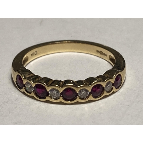 501A - AN 18 CARAT GOLD RING WITH FOUR DIAMONDS AND FIVE RUBY IN LINE SIZE K