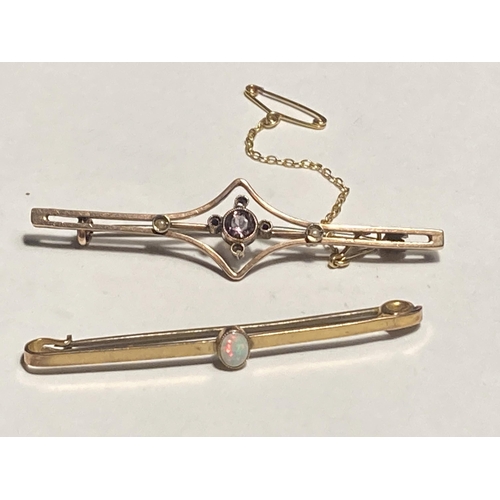 502A - TWO 9 CARAT GOLD BAR BROOCHES ONE WITH AN AMETHYST AND ONE WITH AN OPAL