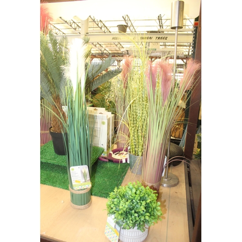 210 - 11 ARTIFICIAL PLANTS AND 4 LAVENDER GARLANDS  + VAT