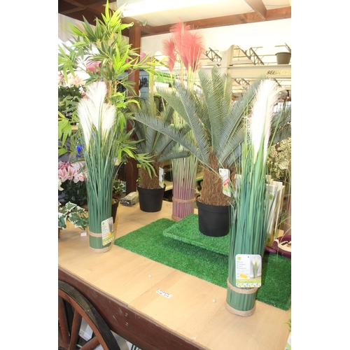 210 - 11 ARTIFICIAL PLANTS AND 4 LAVENDER GARLANDS  + VAT