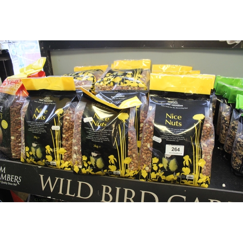 264 - QUANTITY OF BIRD SEED AND STAND LARGE 74  + VAT