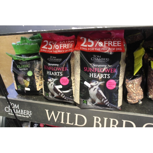 264 - QUANTITY OF BIRD SEED AND STAND LARGE 74  + VAT