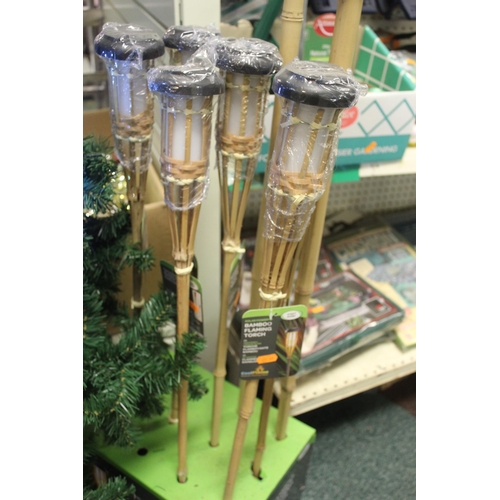 282 - 8 BAMBOO FLAMING TORCHES  + VAT