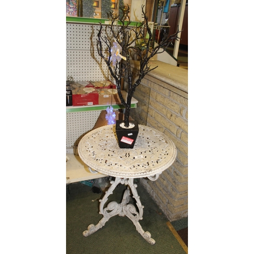 353 - CAST IRON TABLE AND TREE  + VAT