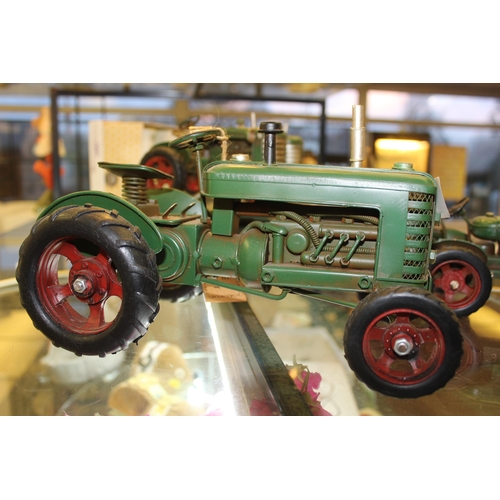 421 - 4 TRACTOR ORNAMENTS + VAT