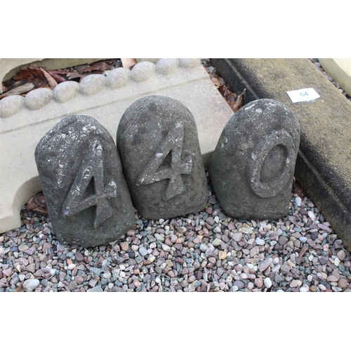 64 - 10 VARIOUS CONCRETE ITEMS INCLUDING 1 FLAG, 1 STEPPING STONE, 5 KERB STONES AND 3 NUMBERS  + VAT