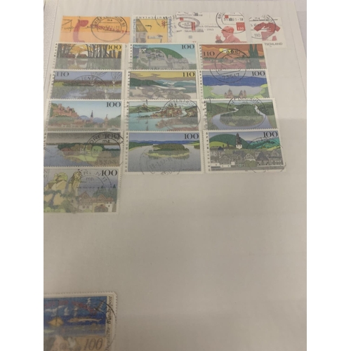 334A - A STAMP ALBUM CONTAINING STAMPS FROM GERMANY AND DDR