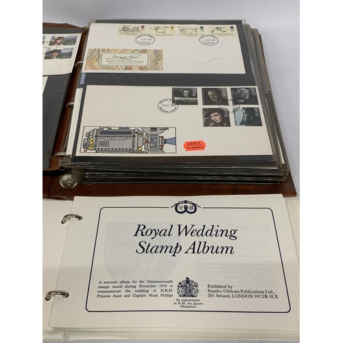 439A - A POST OFFICE FIRST DAY COVERS ALBUM TOGETHER WITH A ROYAL WEDDING 1973 STAMP ALBUM PRINCESS ANNE AN... 