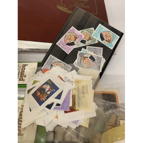 442A - TWO STAMP ALBUMS CONTAINING STAMPS FROM AROUND THE WORLD TOGETHER WITH A QUANTITY OF LOOSE STAMPS AN... 