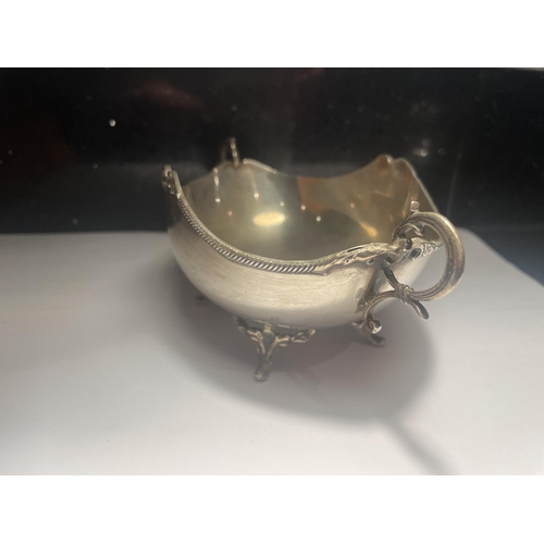 42 - A MARKED 800 SILVER TWIN HANDLED DISH