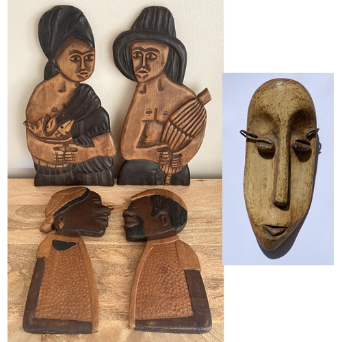 107 - FIVE VINTAGE WOODEN AFRICAN TRIBAL MASKS TO INCLUDE TWO PAIRS OF HANGING FACE ORNAMENTS - SAO TOME A... 