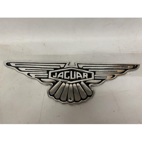 127A - A CHROME JAGUAR SIGN