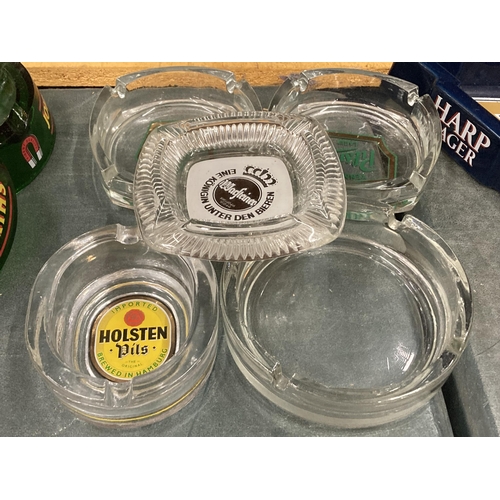 249 - FIVE GLASS ASHTRAYS TO INCLUDE HOLSTEN, PILSNER AND WARSTEINER