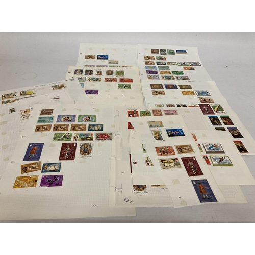 396 - TEN SHEETS CONTAINING STAMPS FROM ANTIGUA