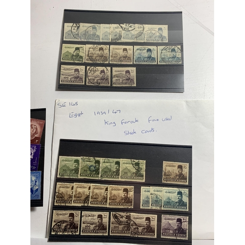 494A - A MIXED LOT TO INCLUDE A NORMAN ROCKWELLNHM SET, KING FAROUK FINE USED STOCK CARDS, EGYPT 1958 STOCK... 