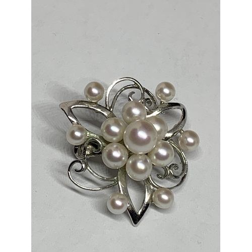 582 - TWO SILVER BROOCHES