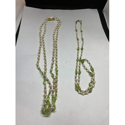 630 - TWO NECKLACES PEARLS AND PERIDOT IN A PRESENTATION BOX