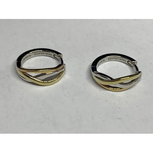 631 - A PAIR OF SILVER AND TRI COLOURED GOLD PLATED EARRINGS IN A PRESENTATION BOX