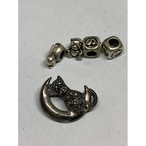 634 - VARIOUS ITEMS TO INCLUDE SILVER CHARMS