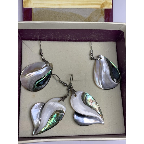 641 - TWO PAIRS OF MOTHER OF PEARL EARRINGS IN A PRESENTATION BOX