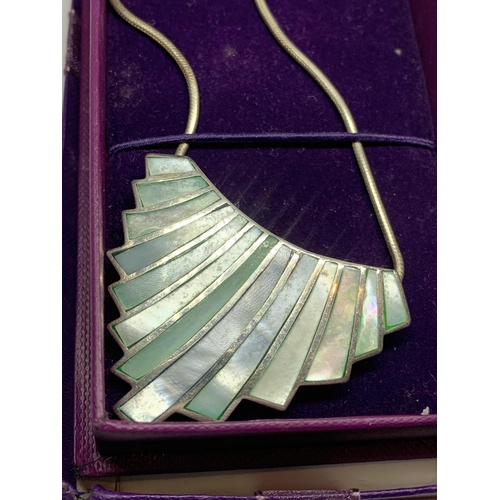 656 - A SILVER AND ENAMEL NECKLACE IN A PRESENTATION BOX