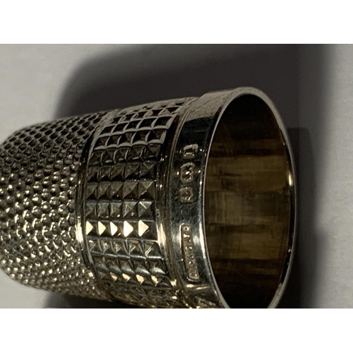 665 - TWO SILVER THIMBLES