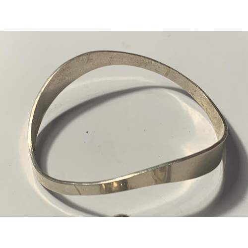 668 - TWO SILVER BANGLES