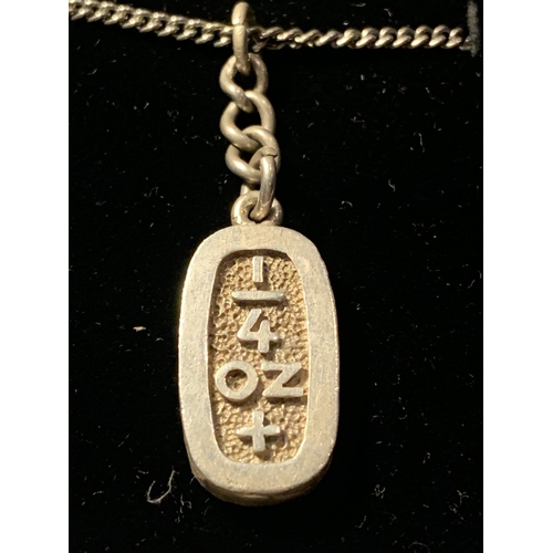 670 - A SILVER 0.25 OUNCE INGOT NECKLACE IN A PRESENTATION BOX