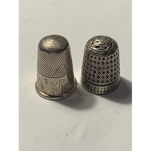 676 - TWO SILVER THIMBLES