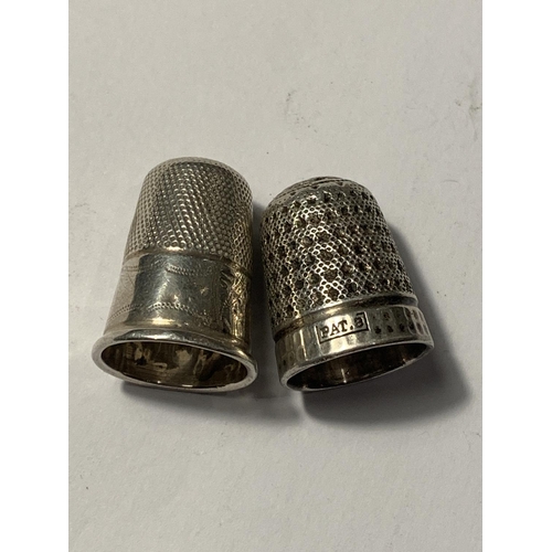 676 - TWO SILVER THIMBLES