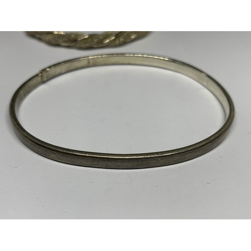 693 - TWO SILVER BANGLES