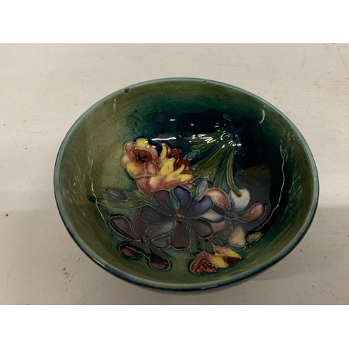 728 - TWO MOORCROFT POTTERY ITEMS TO INCLUDE HIBISCUS ASHTRAY AND ORCHID BOWL