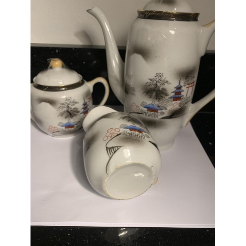 738 - AN ORIENTAL COFFEE POT WITH JUG AND LIDDED SUGAR BOWL