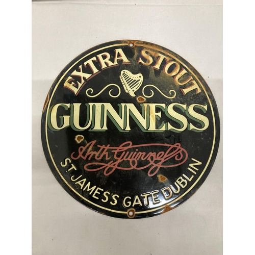 818 - AN ENAMEL EXTRA STOUT GUINNESS CIRCULAR SIGN