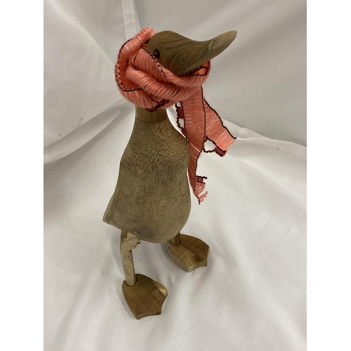 923A - A WOODEN DUCK WITH SHAWL