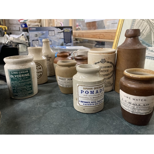 964 - A GROUP OF VINTAGE STONEWARE JARS AND BOTTLES, SOME WITH NEWER LABELS