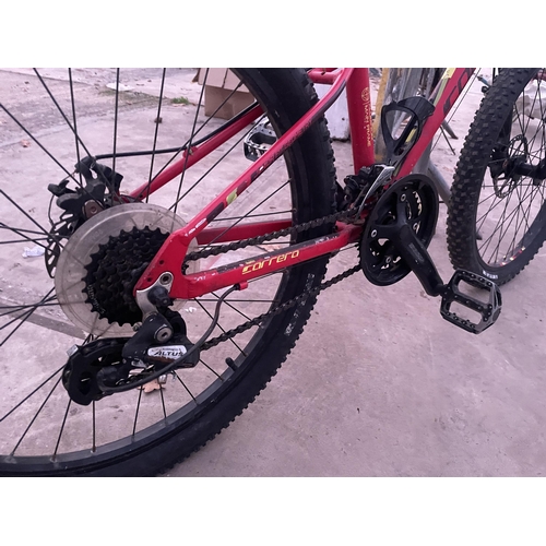 1874 - A CARRERA BOYS BIKE WITH FRONT SUSPENSION AND 21 SPEED SHIMANO GEAR SYSTEM