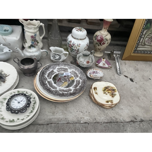 2061 - AN ASSORTMENT OF ITEMS TO INCLUDE CERAMICS, CLOCKS AND JUGS ETC