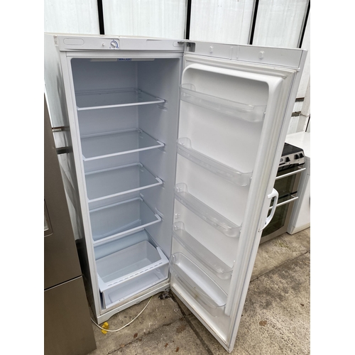 2357 - A TALL WHITE INDESIT UPRIGHT FRIDGE