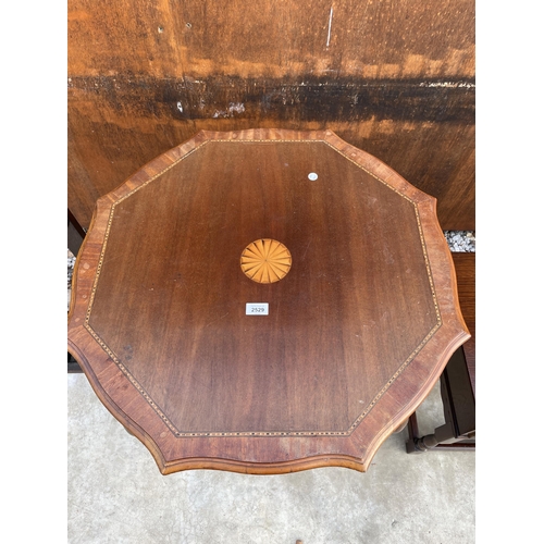 2529 - AN EDWARDIAN MAHOGANY AND INLAID TWO TIER CENTRE TABLE, 29