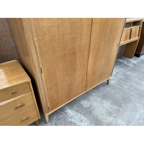 2851 - AN OAK LEBUS LINK TWO DOOR WARDROBE AND 4'6' CONTINENTAL HEADBOARD