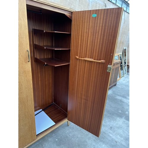 2851 - AN OAK LEBUS LINK TWO DOOR WARDROBE AND 4'6' CONTINENTAL HEADBOARD