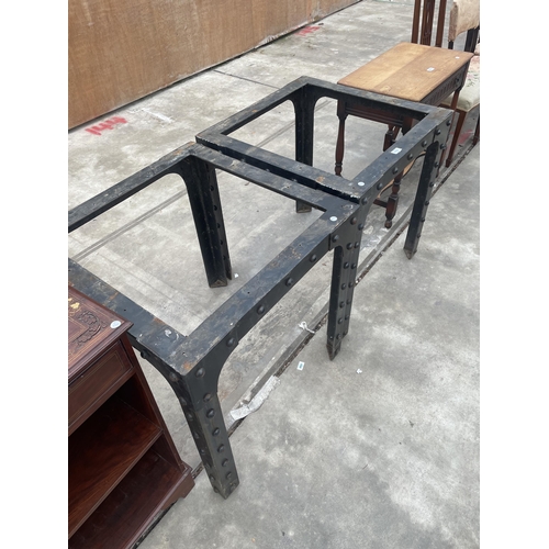 2883 - A PAIR OF CAST IRON INDUSTRIAL LOOK TABLES, BASE EMBELLISHED WITH STUBS, 28