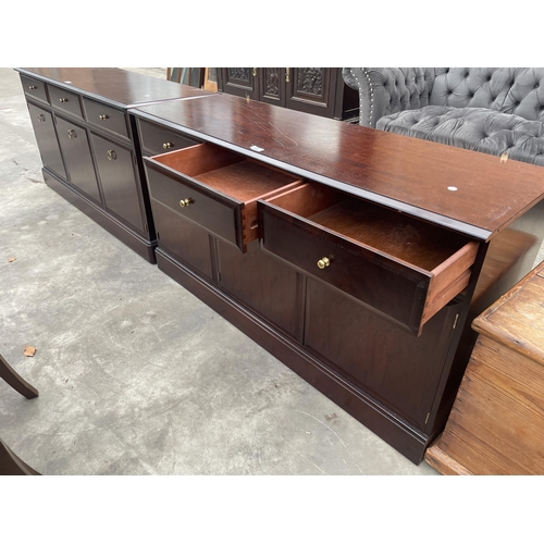 2901 - A STAG MINSTREL SIDEBOARD ENCLOSING THREE DRAWERS AND THREE CUPBOARDS, 54