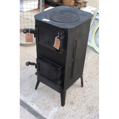 673 - CAST IRON DOUBLE OPENING STOVE/WOOD BURNER  NO VAT