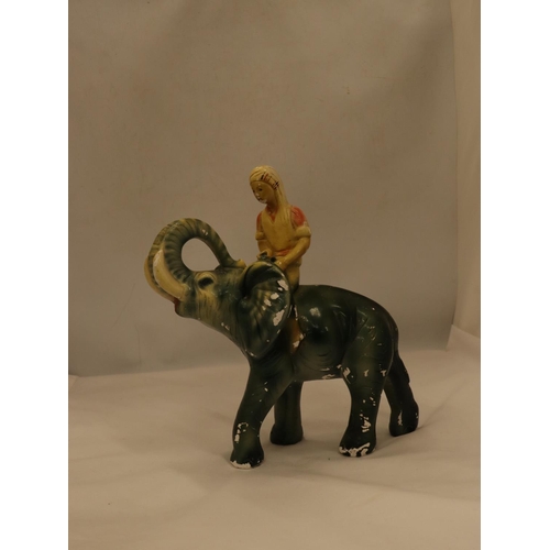 102 - A VINTAGE CHALK FIGURE OF A BOY ON AN ELEPHANT, HEIGHT 30CM, LENGTH APPROX 24CM