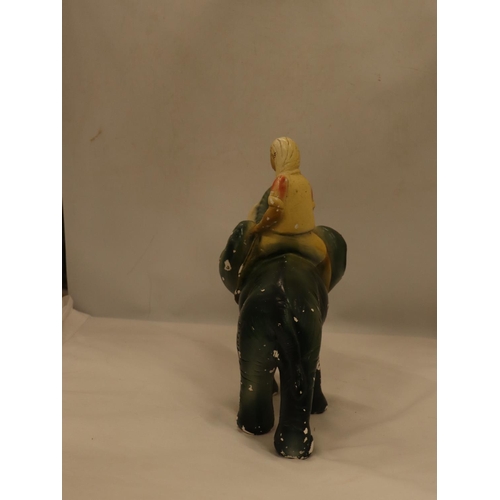 102 - A VINTAGE CHALK FIGURE OF A BOY ON AN ELEPHANT, HEIGHT 30CM, LENGTH APPROX 24CM