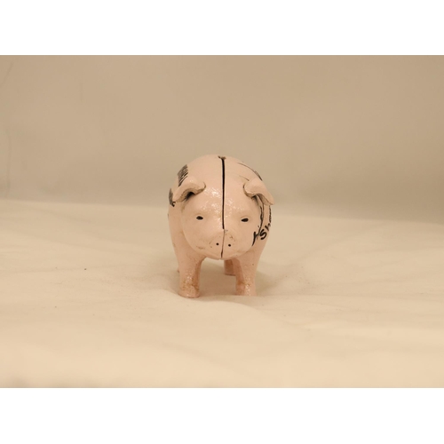 108 - A HEAVY CAST BUTCHERS PIG MONEY BOX