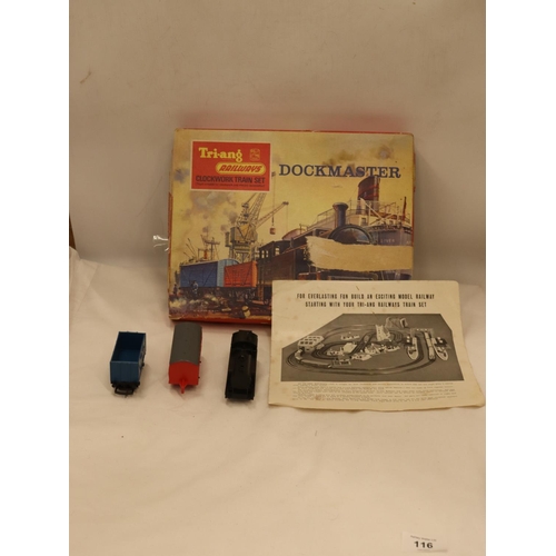 116 - A VINTAGE TRI-ANG DOCKMASTER CLOCKWORK TRAIN SET - BOXED